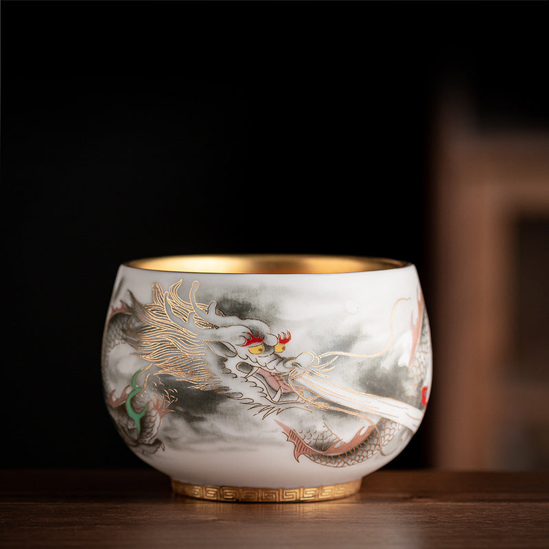 Chinese tea set, traditional craftsmanship, dragon-shaped gilded host cup