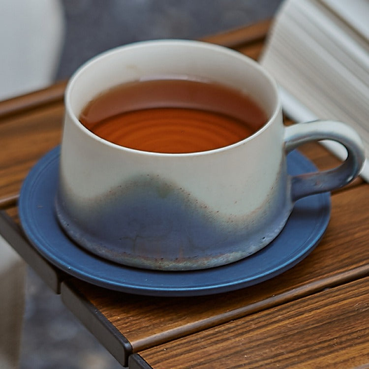 Traditional craftsmanship, mountain and sea blue coffee cup